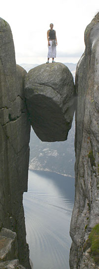 Kjeragbolten is a boulder wedged 1000m above Lysefjord. If this looks too easy, join the base jumpers